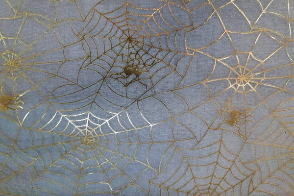 Rainbow Fabrics EO: Sunny Gold Spider Webs Organza Black Fabric