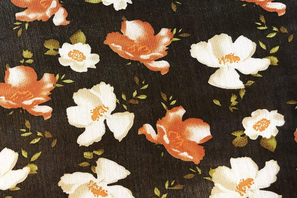 Rainbow Fabrics PTC: Light Cream And Dark Orange Flower Printed Chiffon Price per meter