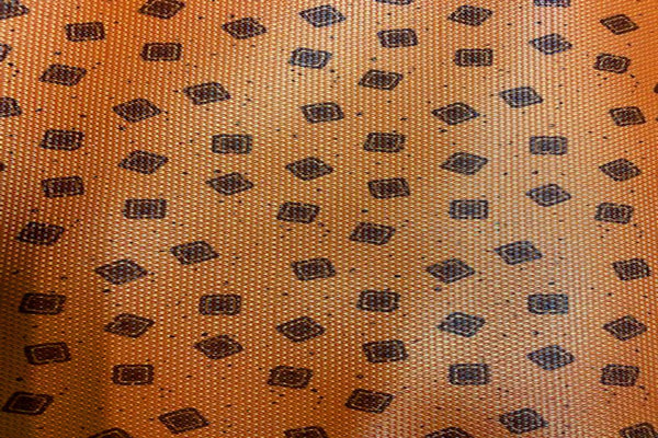 Rainbow Fabrics VE: Dark Brown Small Squares On Light Orange Vinyl