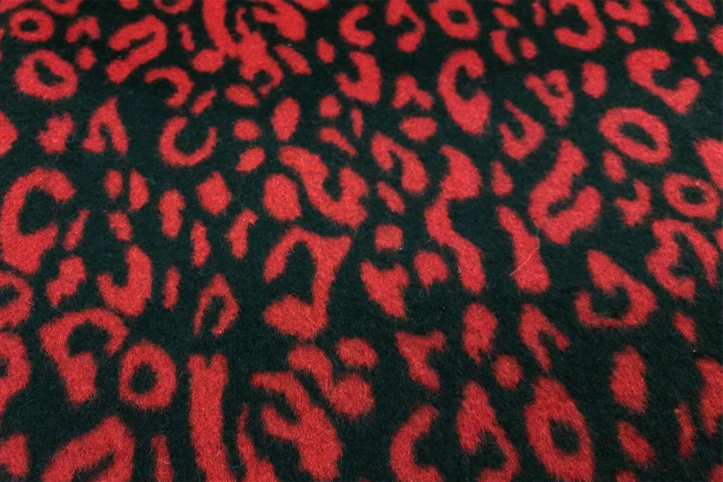Rainbow Fabrics WF: Red Knotted Abstract on Black Wool